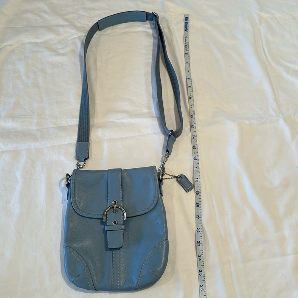 Baby blue coach shoulder bag with adjustable strap